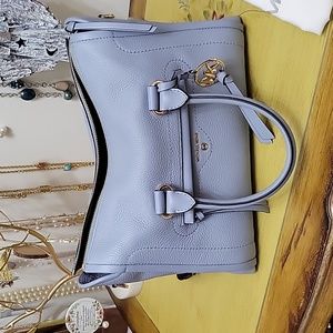 Michael Kors Woman's Satchel with dust cover and shoulder strap.